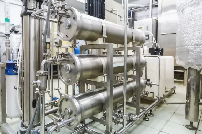 Pipes in conditioning or destilation room on pharmaceutical industry or chemical plant